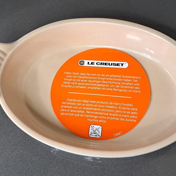 Le Creuset Oval Baker in Cream and White Stoneware